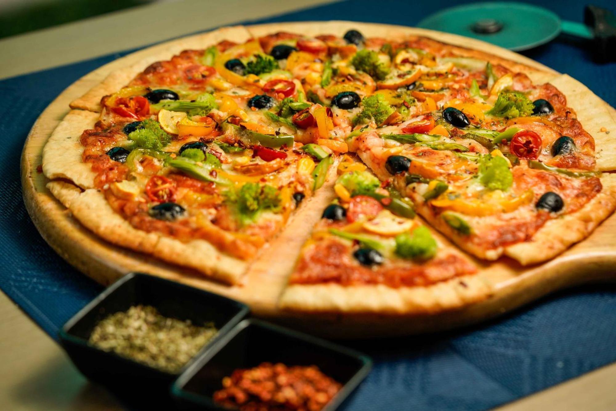 Novotel Kolkata Hotel And Residences Eksteriør bilde Pizza